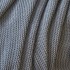 Gebreide deken met pompons 130x150 cm