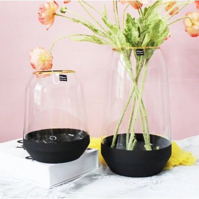 Glass vase with black...