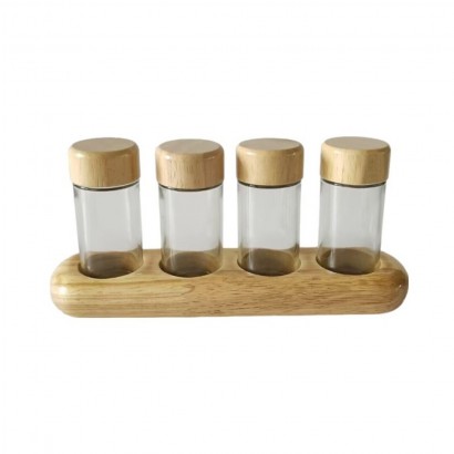 4 spice jars with wooden...
